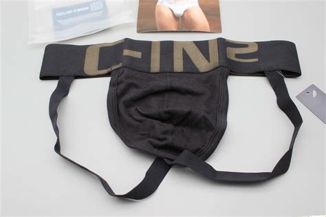 10 jockstrap with a 2- waistband and leg straps that attach at the side of the hips. . Cin2 jockstrap